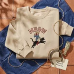 Lollidollyart Midnight Meow-boy Vintage Western Embroidered Sweatshirt - Sand Personalized Gift MTG 260325 019 AI Mockup 20260325 054012.webp