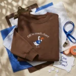 Cheer Coach Gift Embroidered Sweatshirt - Silly Goose One More Time Design, Brown MTG 260326 098 AI Mockup 20260326 113552.webp