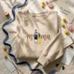 Lollidollyart Personalized Family Portrait MAMA Embroidered Sweatshirt - Sand Custom Gift for Mom MTG 260326 132 AI Mockup 20260326 131940 1.webp