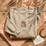 Cowboy Toad Meme Embroidered Sweatshirt - Funny Ironic Frogcore Western Gift, Sand embroidered-sweatshirt