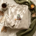 Short Rest DnD Embroidered Sweatshirt - Cozy Frog Campfire Cottagecore RPG Gift embroidered-sweatshirt